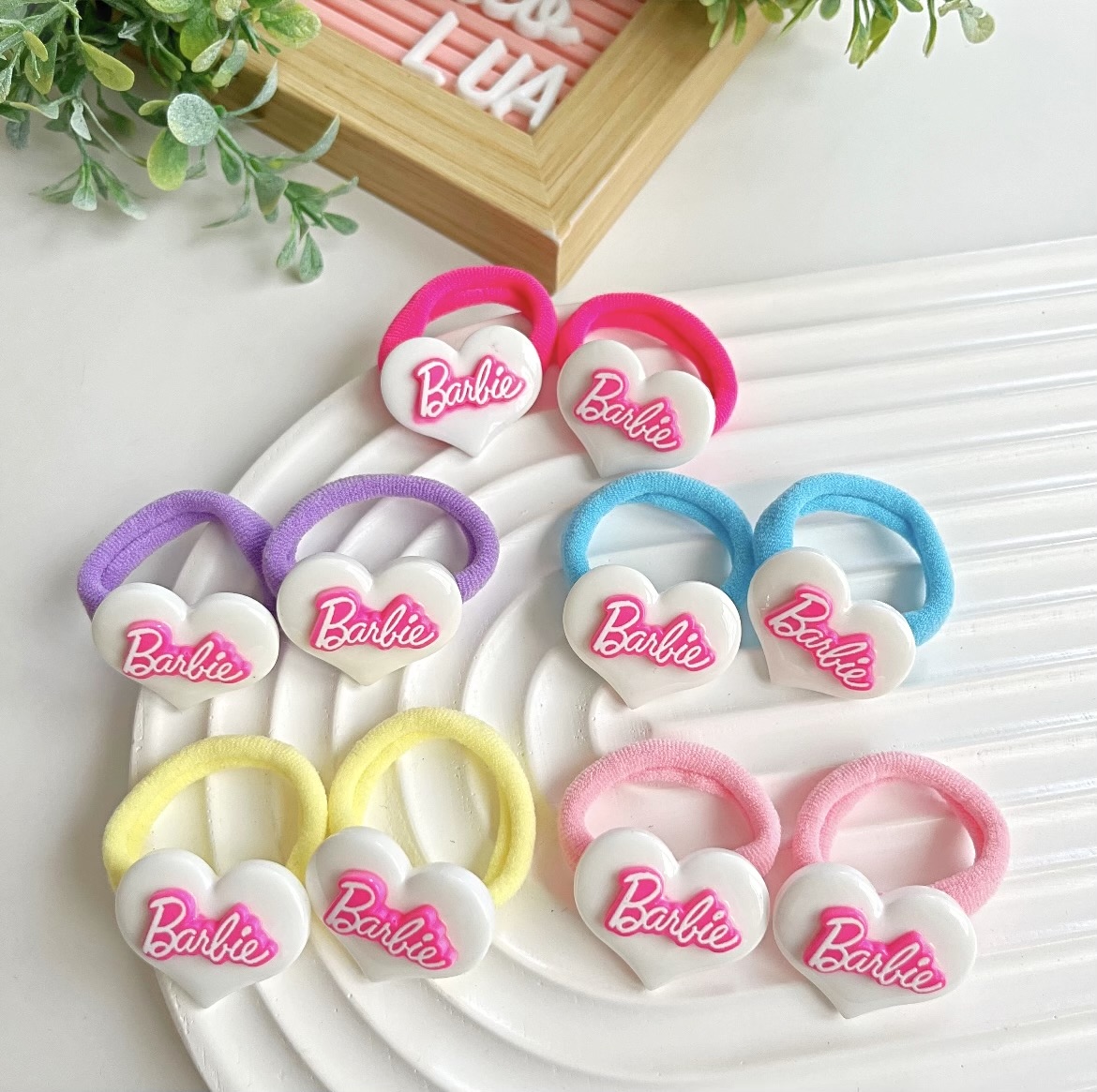 Barbie%20figürlü%20lastik%20toka%20çifti