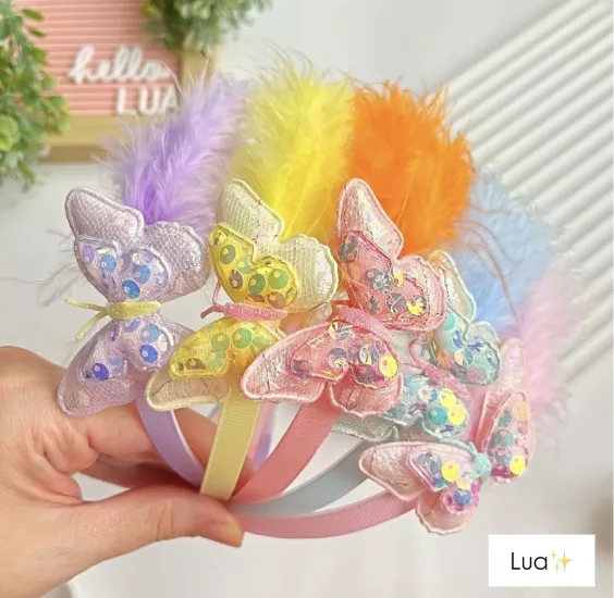 Tüy ve kelebek detaylı taç adet