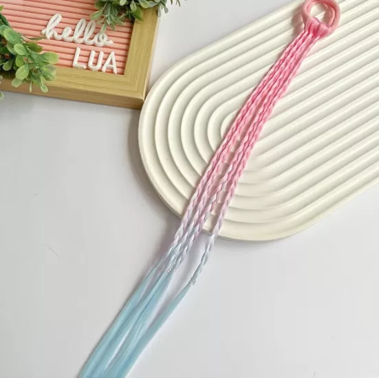 Renkli örgü saç detaylı toka