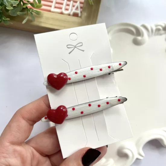 Kalp detaylı pens toka çifti